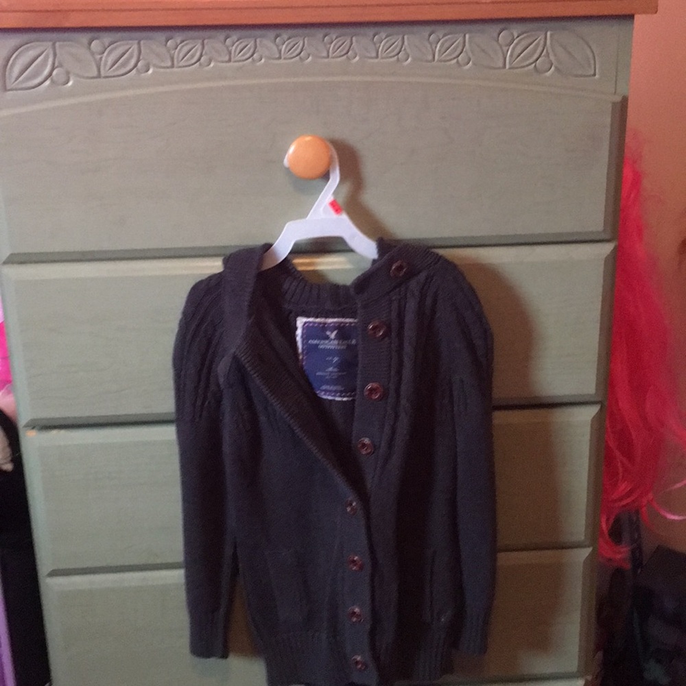 Child’s gray sweater